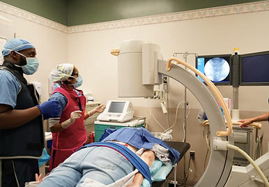 Pain fellow Dr. Thebaud and Pain attending Dr. Chenna perform and pain block under fluoroscopy in the pain clinic.